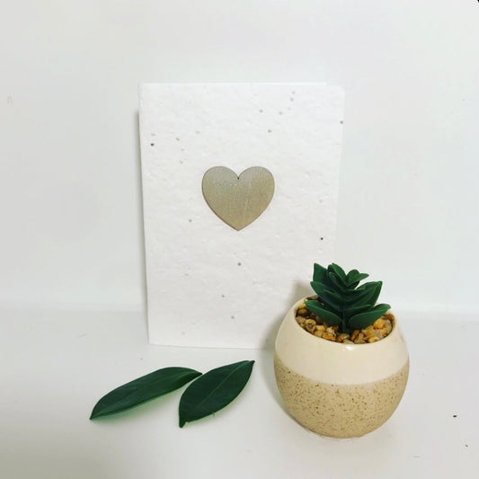 Seeded, plantable greeting card. With hand painted silver, heart motif .