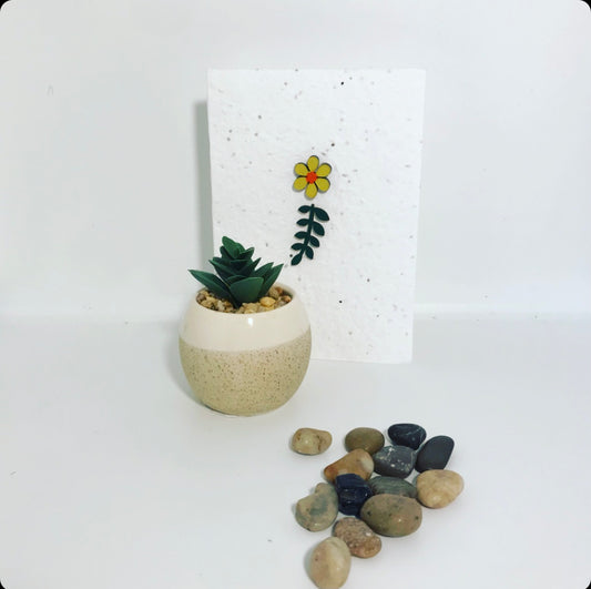 Seeded, plantable greeting card. With hand painted yellow flower and leaf motif .